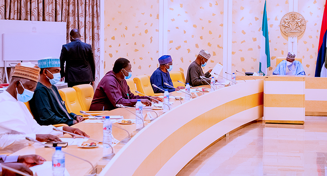 President Buhari receives a briefing from Chairman and Members of the Independent National Electoral Commission (INEC) in State House on June 1, 2021. Bayo Omoboriowo/State House