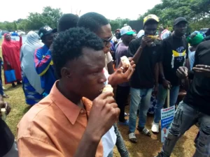 Supporters Eat “Agbado” At City Boy Movement Concert In Abuja