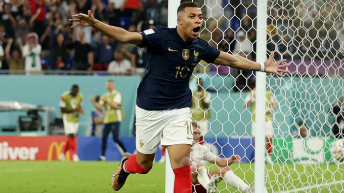 Qatar 2022: Mbappé double sends  France to knockout stage