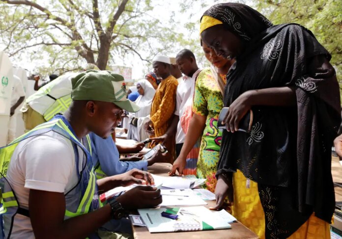 FILE PHOTO: People arrive to cast their votes during Nigeria's presidential election at a polling station in Yola, Adamawa State, Nigeria February 23, 2019